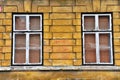 Two windows in the old house Royalty Free Stock Photo