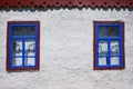 Two windows on the white wall Royalty Free Stock Photo