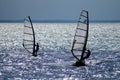 Two windsurfers