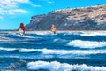 Two windsurfers surfing on Prasonisi beach Rhodes, Greece Royalty Free Stock Photo