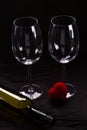 Two wine glasses, bottle and gift box. Royalty Free Stock Photo