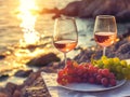 two wine glasses with grape fruit with sea beach, AIgenerated Royalty Free Stock Photo