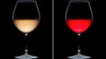 Two wine glasses, one filled with white wine and the other with red wine, stand side-by-side against a black backdrop Royalty Free Stock Photo