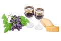 Two wine glasses with red wine, cheese and blue grape Royalty Free Stock Photo