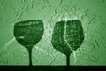 Two wine glasses shadow in green tone