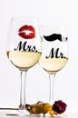 Two wine glasses with wine isolated on a white background. Glasses for woman and man. White wine. Happy lifestyle. Romantic. Royalty Free Stock Photo