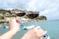 Two wineglasses in the hands Royalty Free Stock Photo