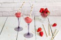 Two wineglasses with strawberry sorbet