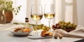 Two wineglasses of vintage chardonnay with delicious appetizers 3