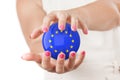 Two Woman Hands Protecting European Union Flag Earth Globe Sphere. Royalty Free Stock Photo