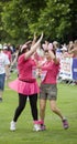 Two woman high fiving, Race-for-Life UK