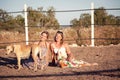 Two woman horse and dog outdoor in summer happy Royalty Free Stock Photo