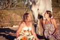 Two woman horse and dog outdoor in summer happy Royalty Free Stock Photo