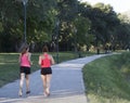 Two woman joggin in a park