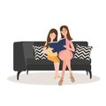 Two woman mom and daughter reading book together sitting at sofa