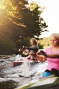 Two woman racing in kayaks Royalty Free Stock Photo