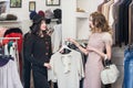 Two woman is shopping.