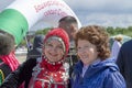 Two women are adults, one of them is in  Bashkir national costume, other is not, at Muslim festival Royalty Free Stock Photo