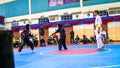 Two women athletes competes during the `Sukan Kombat 6 Penjuru` competition or fighting combat games.