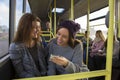Two women on the bus Royalty Free Stock Photo