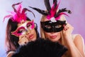 Two women with carnival venetian masks Royalty Free Stock Photo