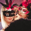 Two women with carnival venetian masks Royalty Free Stock Photo