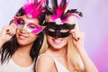 Two women with carnival venetian masks Royalty Free Stock Photo