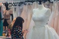 Two women choose a wedding dress