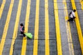 Two women crossing street on pedestrian crossing - motion blur