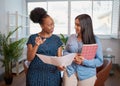 Two women discuss work solutions in boardroom office, mentorship learning