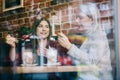 Two women eating and talking in a restaurant Royalty Free Stock Photo