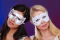 Two women face with carnival venetian masks Royalty Free Stock Photo