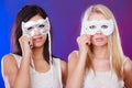 Two women face with carnival venetian masks Royalty Free Stock Photo