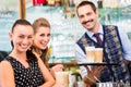 Two women friends in cafe drinking cappuccino Royalty Free Stock Photo