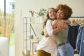 Two Women Friends Celebrating Successful For Their Online Fashion Business From Home Together Royalty Free Stock Photo