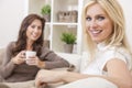 Two Women Friends Drinking Tea or Coffee at Home Royalty Free Stock Photo