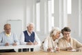 Friends talking during IT classes Royalty Free Stock Photo