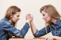 Two women having arm wrestling fight Royalty Free Stock Photo