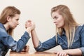 Two women having arm wrestling fight Royalty Free Stock Photo