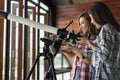 Two woman looking through telescope Royalty Free Stock Photo