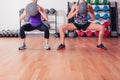 Two women with medicine balls Royalty Free Stock Photo