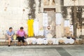 Two women offering handmade embroidery in Zadar, Croatia