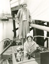 Two women out sailing with their mascot