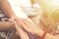 Two women praying together and encourage each other. color filter added. Royalty Free Stock Photo