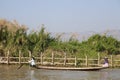 Women Rowing Canoe