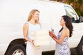 Two Women Running Catering Business With Van