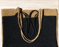 Two women\'s bags made of raffia black and beige Royalty Free Stock Photo