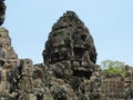 Two women`s faces carved in the stone at Bayon Temple in the Khmer temple complex of Angkor Royalty Free Stock Photo