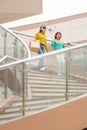 Two women with shopping bags in a mall Royalty Free Stock Photo