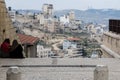 Two women sitting on the stairs watching around Bethlehem